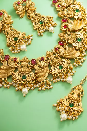 Antique gold lakshmi temple necklace set with earrings and maangtika