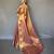 peach peach-coloured & gold-toned woven design zari tissue saree