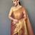 peach peach-coloured & gold-toned woven design zari tissue saree