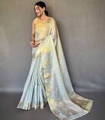 grey grey & gold-toned woven design zari tissue saree