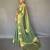green green & gold-toned woven design zari tissue saree