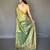 green green & gold-toned woven design zari tissue saree