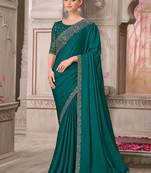 green sequinned solid satin saree