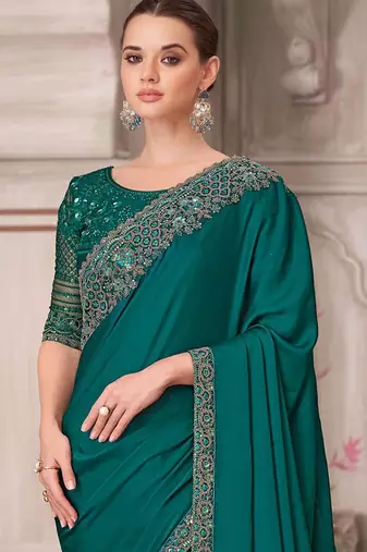 green sequinned solid satin saree