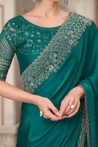 green sequinned solid satin saree