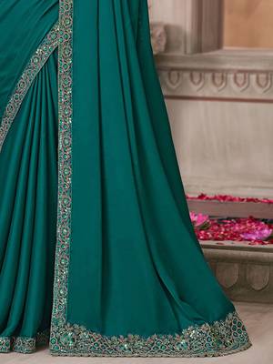 green sequinned solid satin saree 4