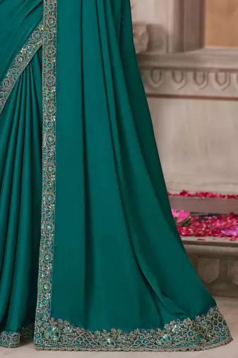 green sequinned solid satin saree