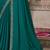 green sequinned solid satin saree