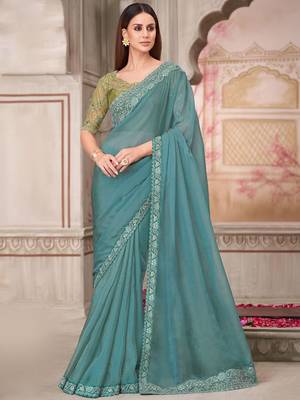 turquoise sequinned pure georgette saree 1