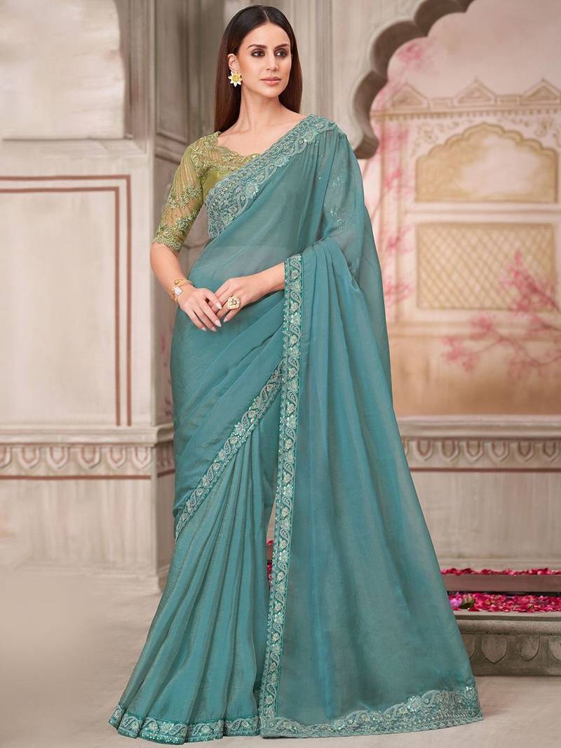 turquoise sequinned pure georgette saree