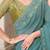 turquoise sequinned pure georgette saree