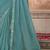 turquoise sequinned pure georgette saree