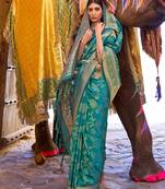 teal teal green & gold-toned ethnic motifs zari silk blend banaras saree