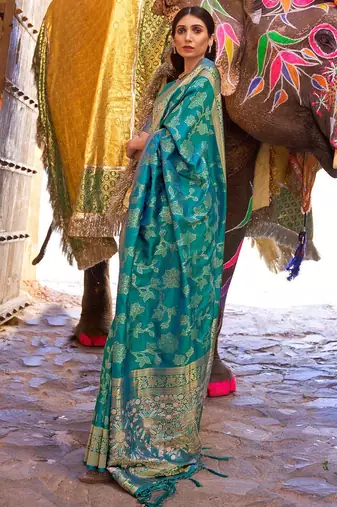 teal teal green & gold-toned ethnic motifs zari silk blend banaras saree