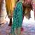 teal teal green & gold-toned ethnic motifs zari silk blend banaras saree