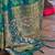 teal teal green & gold-toned ethnic motifs zari silk blend banaras saree