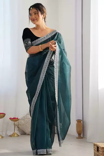 teal embroidered sequinned net saree