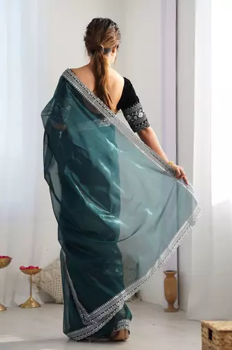 teal embroidered sequinned net saree