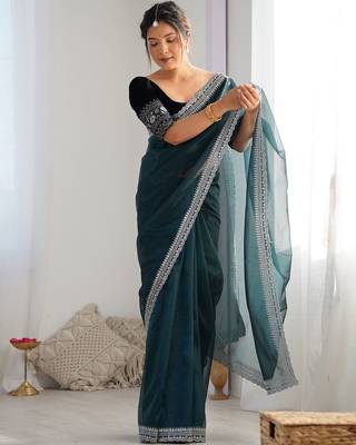teal embroidered sequinned net saree 4