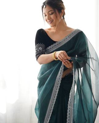 teal embroidered sequinned net saree 5