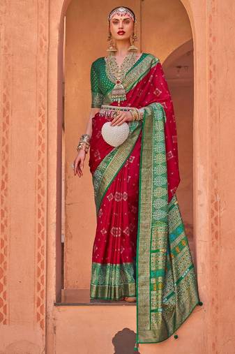 red red & green ethnic motifs printed silk blend patola saree