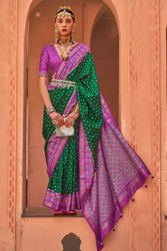 green green & purple ethnic motifs woven design zari patola saree