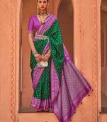 green green & purple ethnic motifs woven design zari patola saree