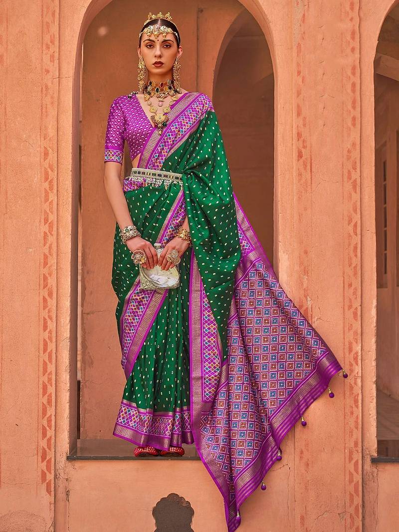 green green & purple ethnic motifs woven design zari patola saree