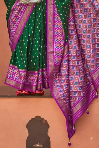 green green & purple ethnic motifs woven design zari patola saree