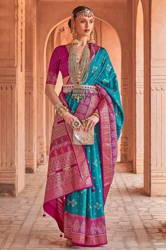 blue blue & pink ethnic motifs printed silk blend patola saree