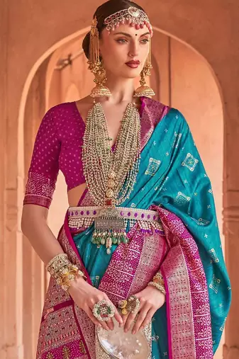 blue blue & pink ethnic motifs printed silk blend patola saree