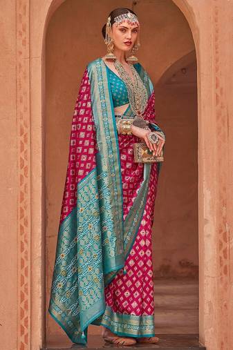 pink pink & blue ethnic motifs printed zari patola saree