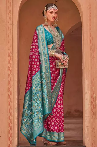 pink pink & blue ethnic motifs printed zari patola saree