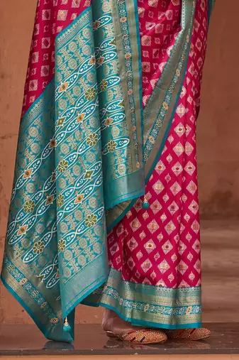 pink pink & blue ethnic motifs printed zari patola saree