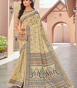 beige beige & green ethnic motifs art silk ikat saree