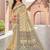 beige beige & green ethnic motifs art silk ikat saree