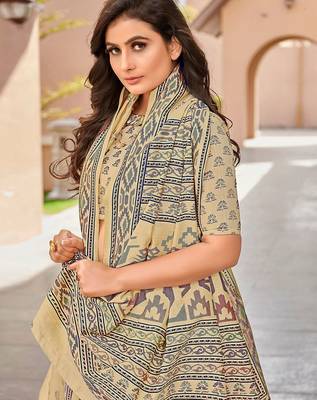 beige beige & green ethnic motifs art silk ikat saree 2