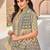beige beige & green ethnic motifs art silk ikat saree