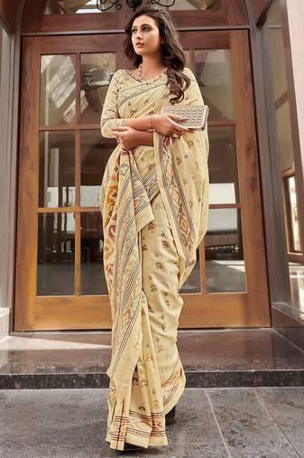 beige beige & pink ethnic motifs art silk ikat saree