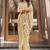 beige beige & pink ethnic motifs art silk ikat saree