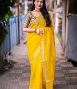 yellow embellished zari linen saree