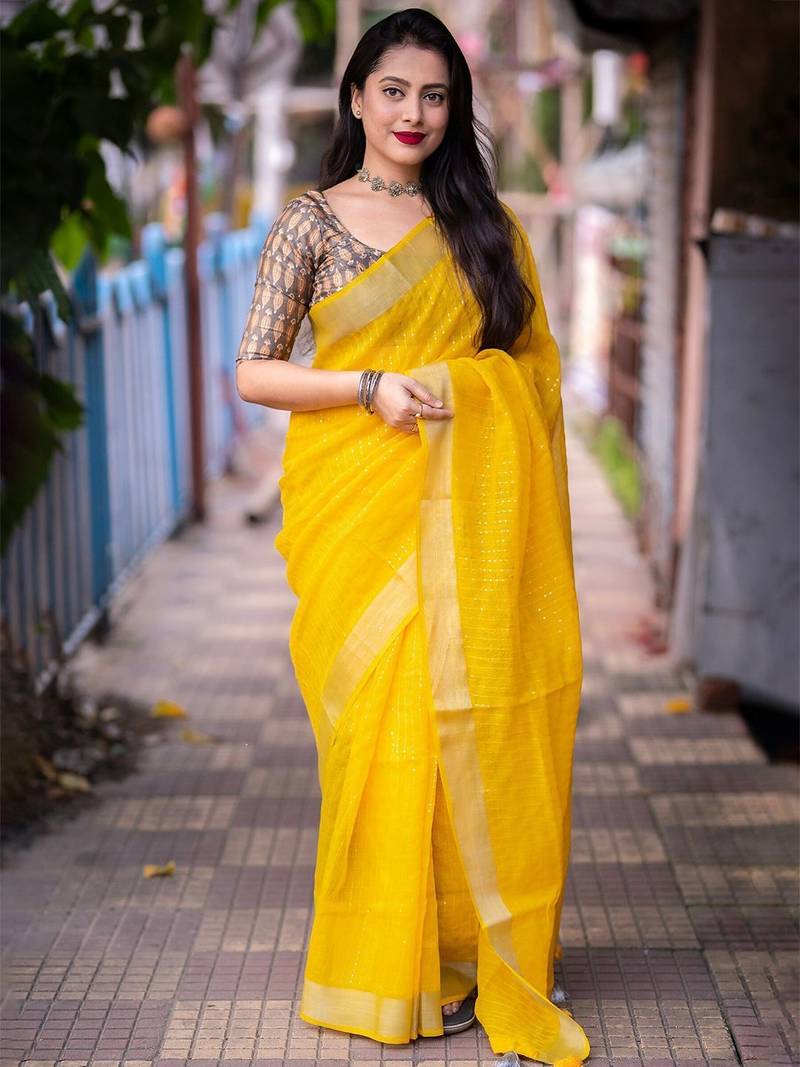 yellow embellished zari linen saree