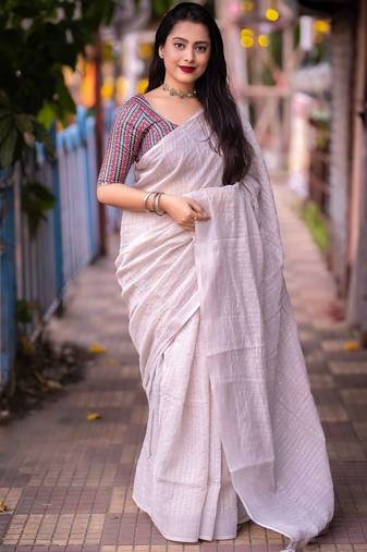 white embellished sequinned linen saree