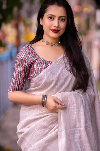 white embellished sequinned linen saree