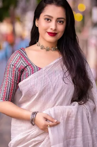 white embellished sequinned linen saree