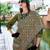 green ethnic motifs printed satin saree