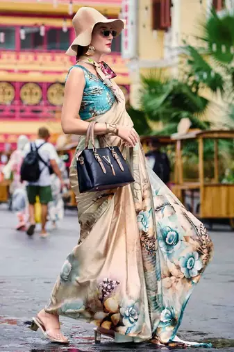 cream women floral printed satin saree