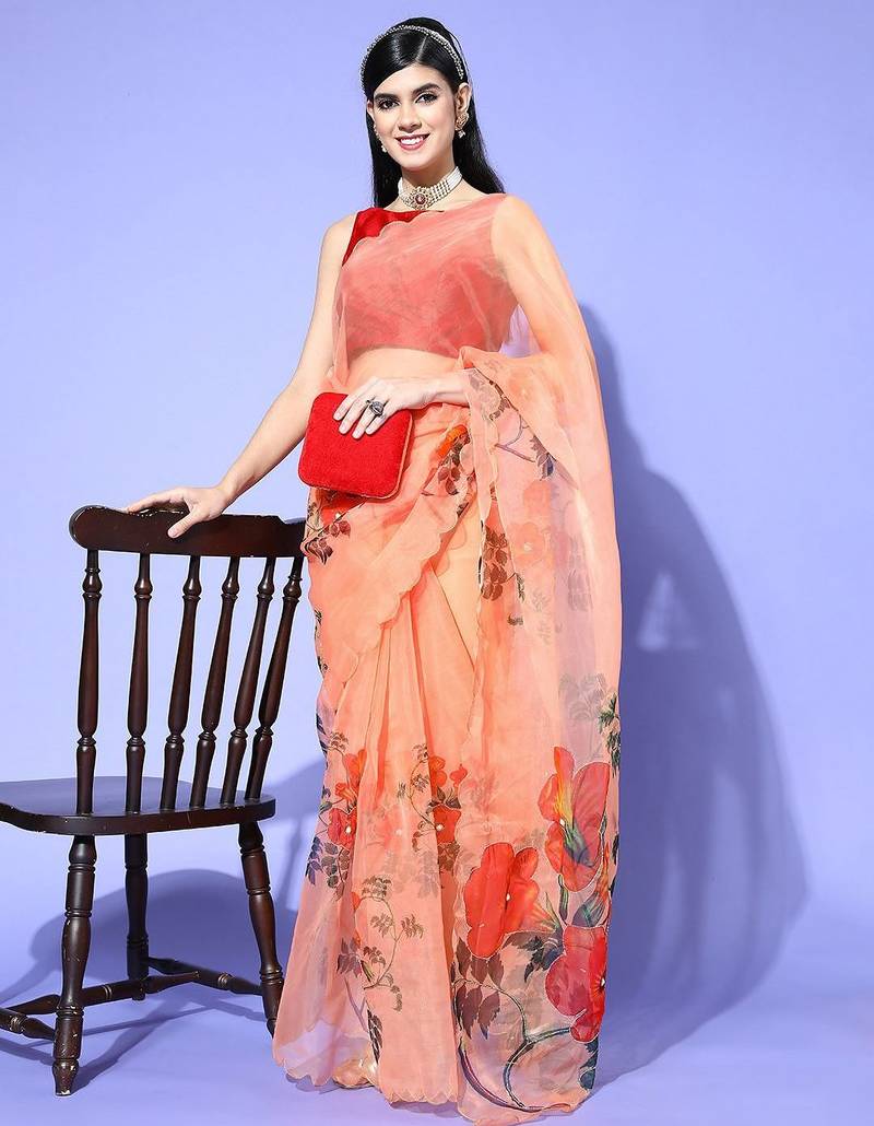 peach floral saree with embellished border