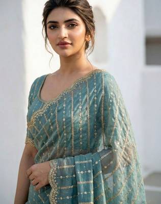 teal embellished sequinned satin heavy work saree 4