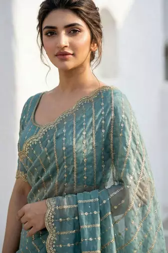 teal embellished sequinned satin heavy work saree